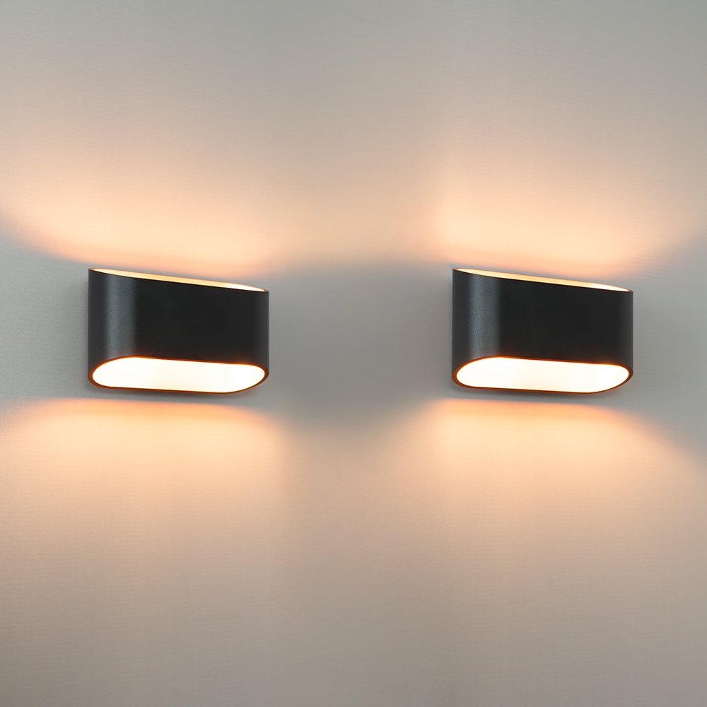 2x Volans nero oro - Ovaalvormige wandlamp met up and downlight, matzwarte coating en goudkleurig interieur