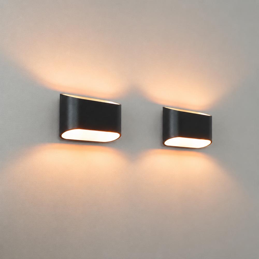 2x Volans nero oro - Ovaalvormige wandlamp met up and downlight, matzwarte coating en goudkleurig interieur